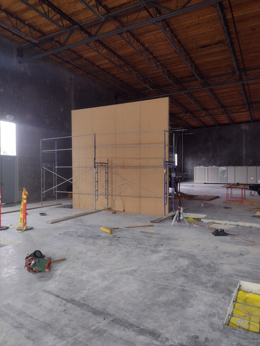 Commercial Maintenance Renovation - unfinished wall inside of warehouse